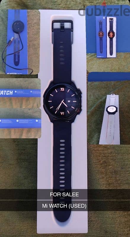 Mi watch بالعلبه والشاحن و ضمان شهر 0