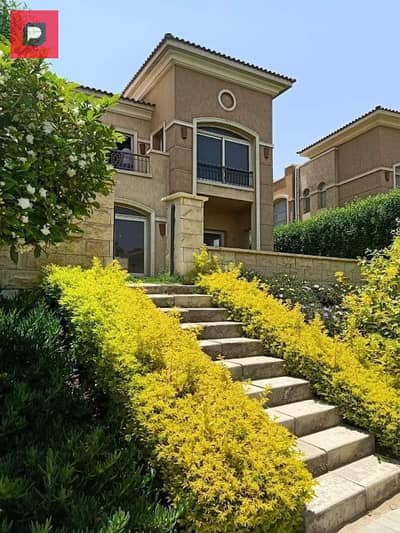 Duplex with garden for sale 224 m in Telal East Compound next to Mountain View and Palm Hills New Cairo View Landscape and Green Area