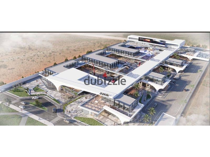 A commercial store for sale in installments, a prime location, Sheikh Zayed, directly on the Dahshour link 4