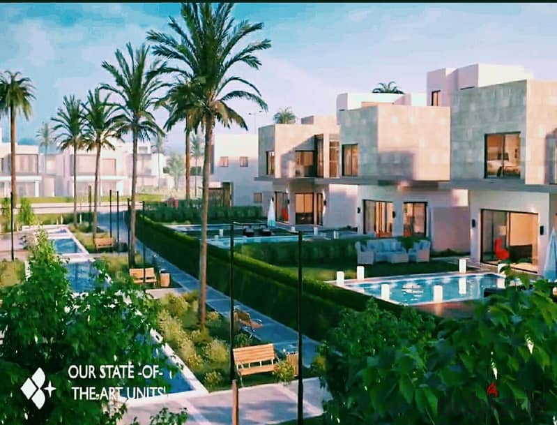 Prime 235 sqm twin house with remaining installments in Karma Gates Compound, in a prime location in Sheikh Zayed. 2