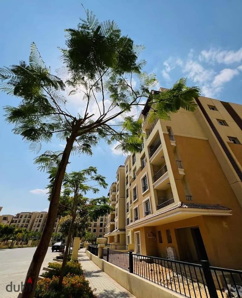 For sale, a 3-bedroom apartment with a lagoon view in Sarai Compound, directly on the Suez Road, with a down payment of 665K over 8 years 4