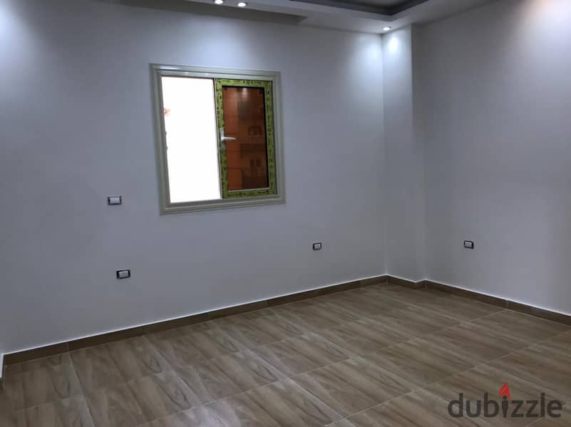 For sale, an apartment inside a villa in Al-Fardous City, Al-Wahat Road, 6th of October 6