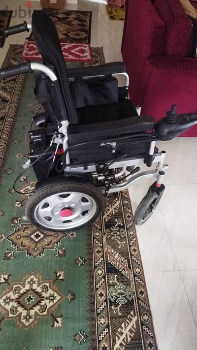 Electric wheel chair كرسي متحرك بضهر متحرك