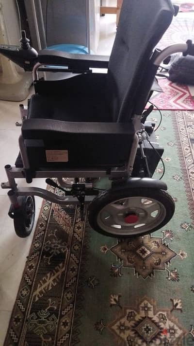 Electric wheel chair كرسي متحرك بضهر متحرك