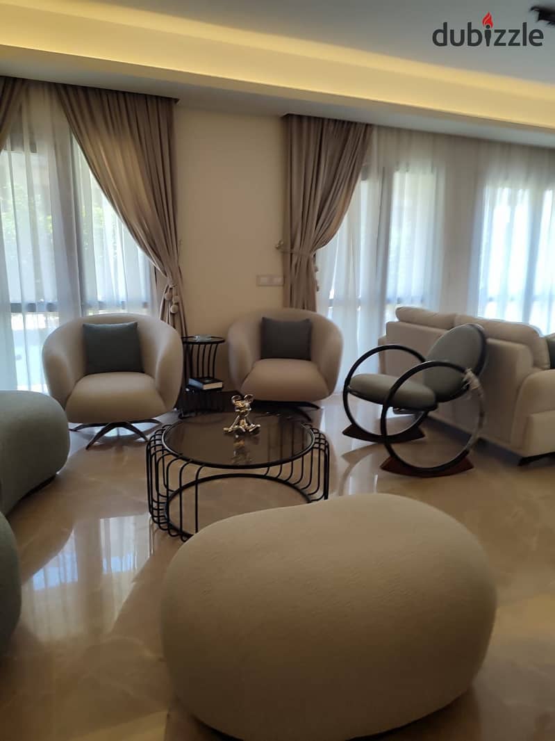 Luxurious fully furnished apartment with garden for rent in Eastown Sodic compound New Cairo fifth settlement 7