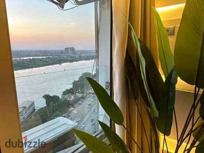 Apartment next to Hilton with a wonderful view, first row directly on the Nile, fully finished with furniture, appliances and air conditioners, and in 0