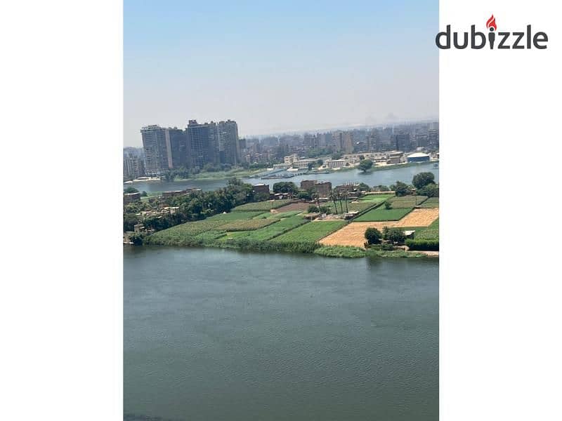 Apartment next to Hilton with a wonderful view, first row directly on the Nile, fully finished with furniture, appliances and air conditioners, and in 8