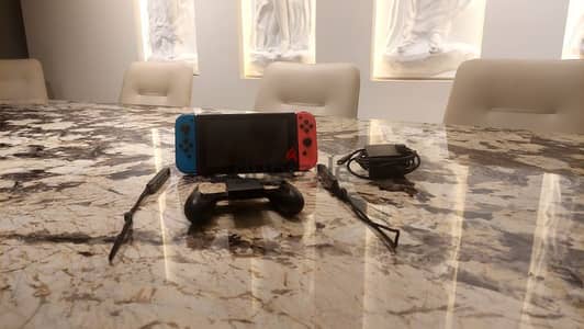 128GB UK Nintendo Switch + 2 Purchased Games