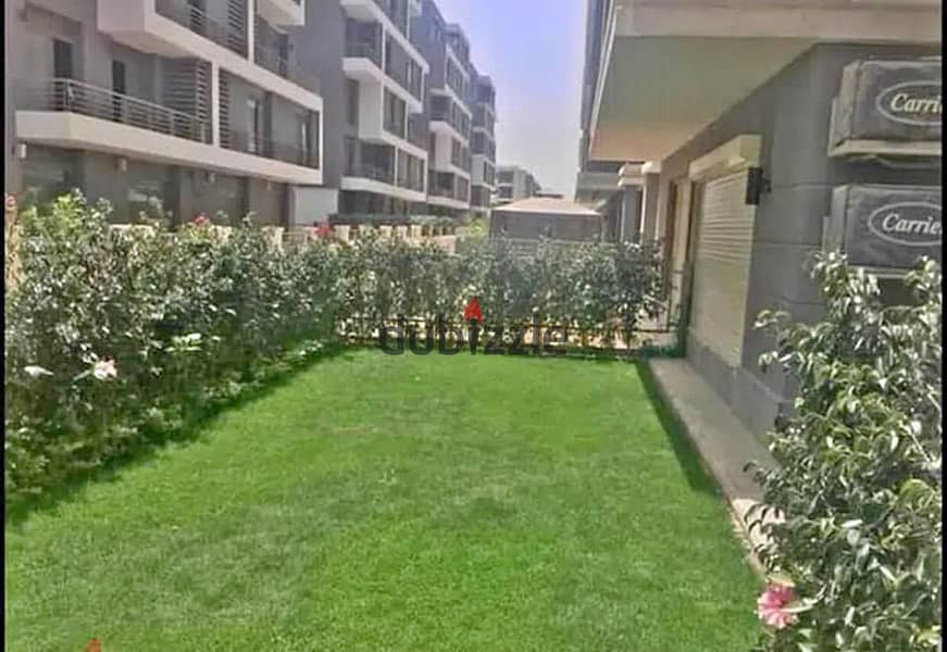 Apartment with garden ready to move open view for sale in new cairo installments next to Al Rehab 1