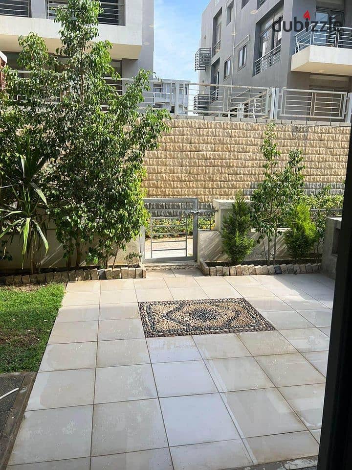 Apartment with garden ready to move open view for sale in new cairo installments next to Al Rehab 2