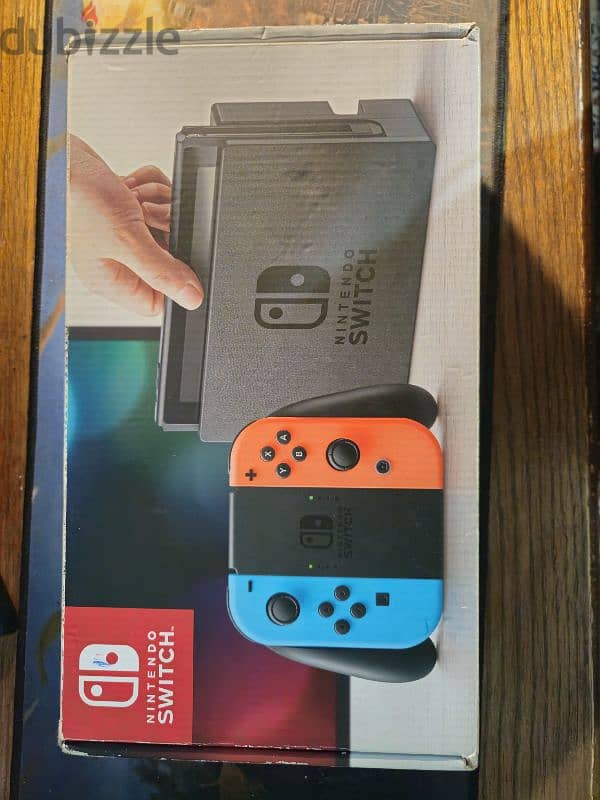 Nintendo Switch V1 (2018) + 2 games 0