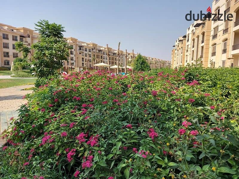 The cheapest price for a two-bedroom apartment, Ready To Move, direct view of the swimming pool, in Stone Residence, Fifth Settlement, New Cairo. 6