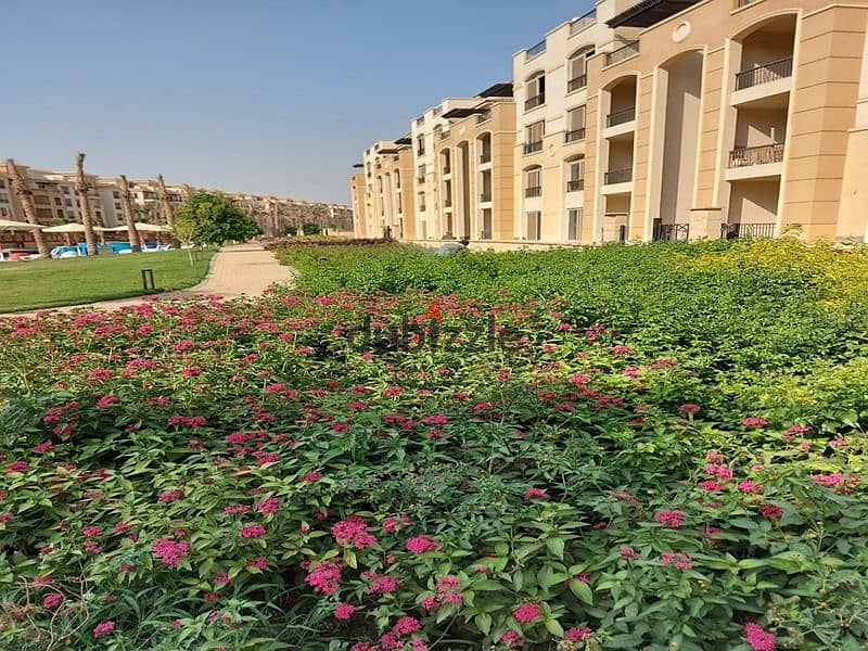 The cheapest price for a two-bedroom apartment, Ready To Move, direct view of the swimming pool, in Stone Residence, Fifth Settlement, New Cairo. 10