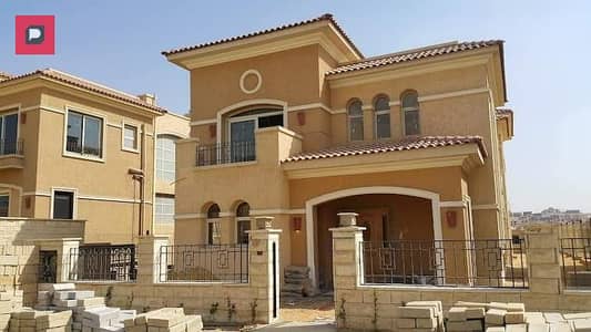 Townhouse villa for sale in New Cairo in Telal East Compound next to Palm Hills and Mountain View, villa phase only, view open to the landscape,