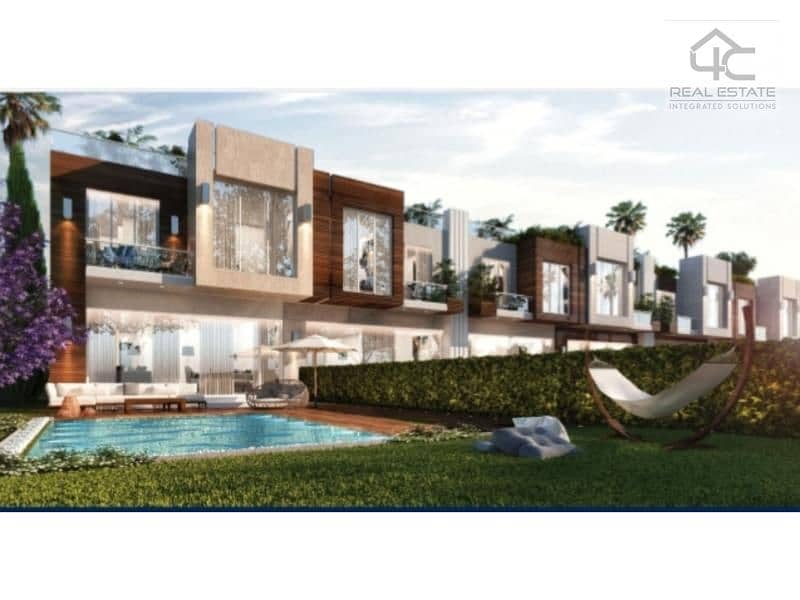 For sale town house middle 225 m prime location at the lowest price in Azzar 2 compound 7