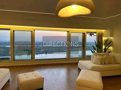 Luxurious furnished apt for sale with hotel services +fantastic view of the Nile directly at bargain price in Reve du Nil next to Hilton maadi