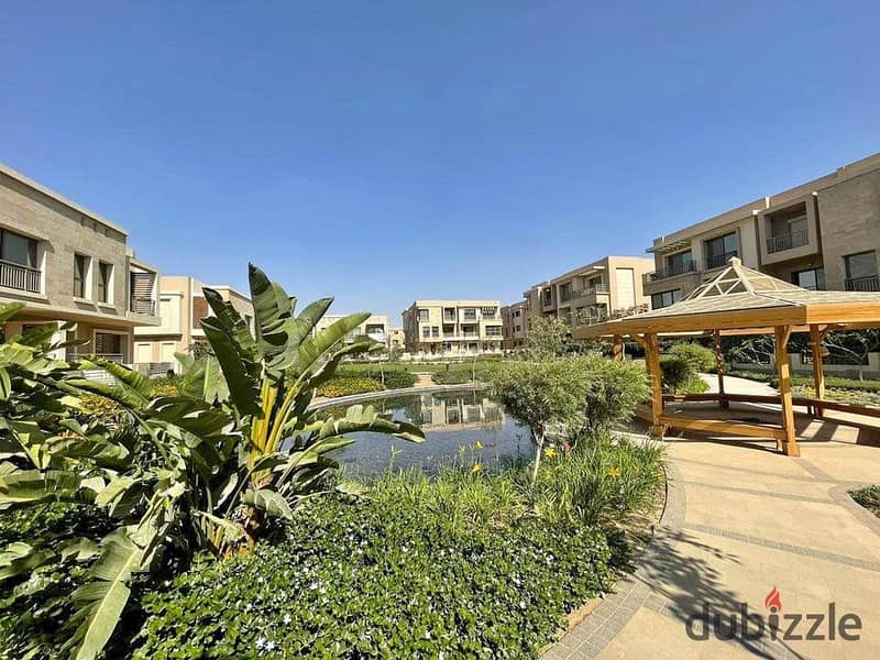 Duplex for sale with a fantastic discount and a distinctive view of the lagoon in the heart of New Cairo 0