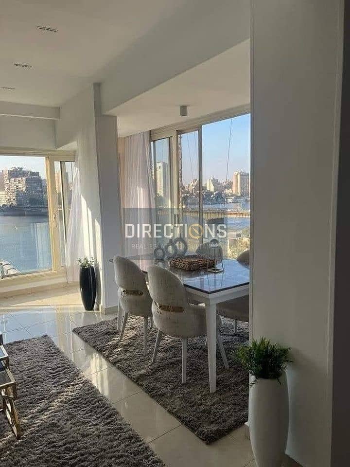 With a Direct view of Dahab Island Ready to move Service APT F. F + ACs + Ikea furniture On the Nile Corniche in Reve Du Nil Beside Hilton Maadi Hotel 1