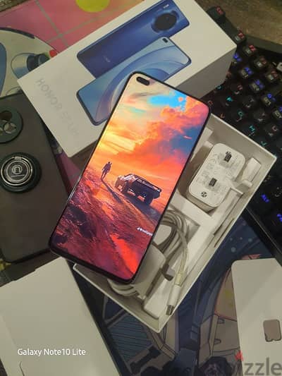 كسر. زيرو رام ٨ و١٢٨ مساحة شاحن ٦٦واتHONOR 50 Lite