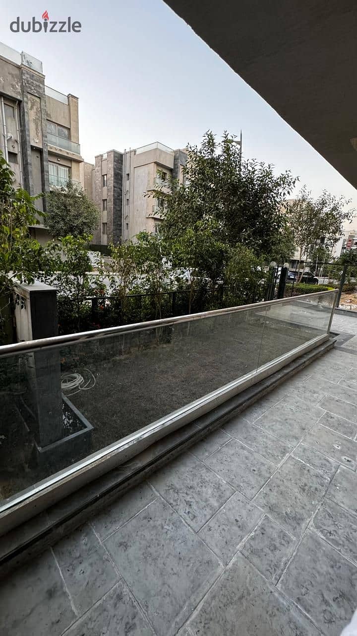 Apartment 133 M with garden 81 M Fully Finished Ready to move for sale in Compound Galleria moon valley _ new cairo 1