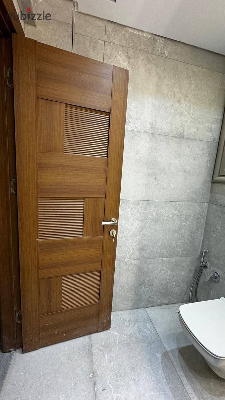 Apartment 133 M with garden 81 M Fully Finished Ready to move for sale in Compound Galleria moon valley _ new cairo 5