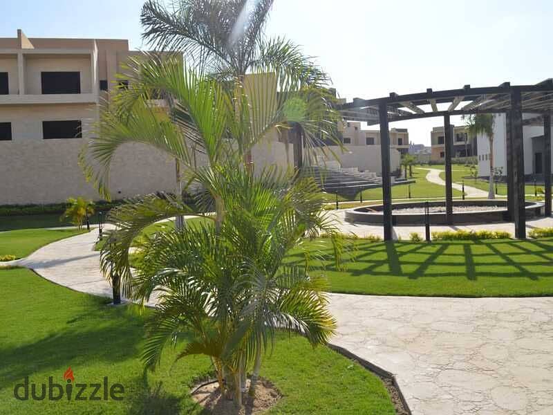 In Sheikh Zayed, a 1200-square-meter villa for sale, immediate delivery, in installments, next to a wall 5