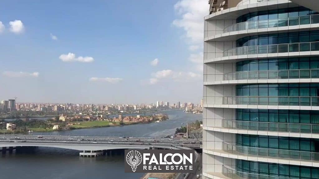 Fully finished hotel apartment (ready to move in now) with panoramic view of the Nile, managed by Hilton Nile Pearl Towers Hotel 0