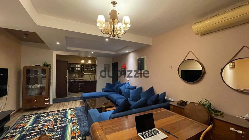 For rent, two-bedroom apartment with garden - fully furnished with kitchen - The Address, Sheikh Zayed 2