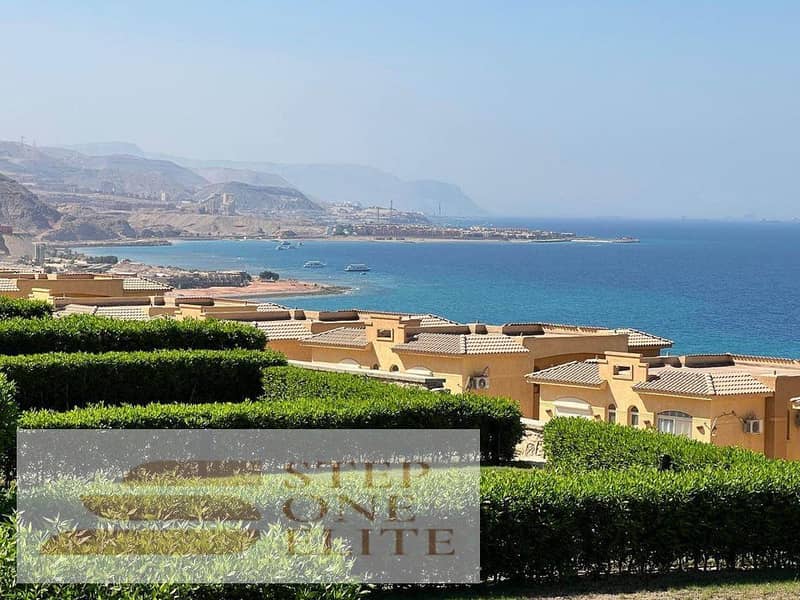 Own a 3-bedroom chalet with a garden, fully finished, and direct sea view in Telal Sokhna 8