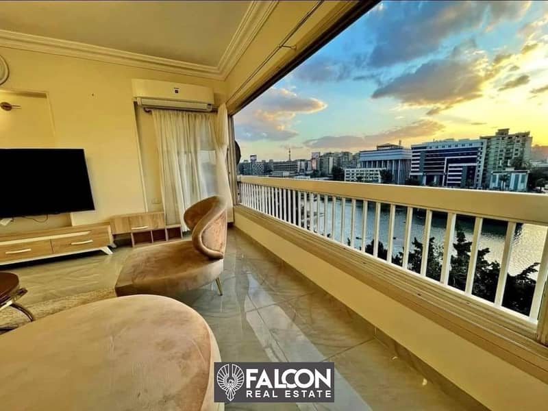 Hotel apartment for sale, 92 sqm, with furnishings and air conditioners, direct view to the Nile, 5-year installments, Reef du Nile, Maadi, immediate 6