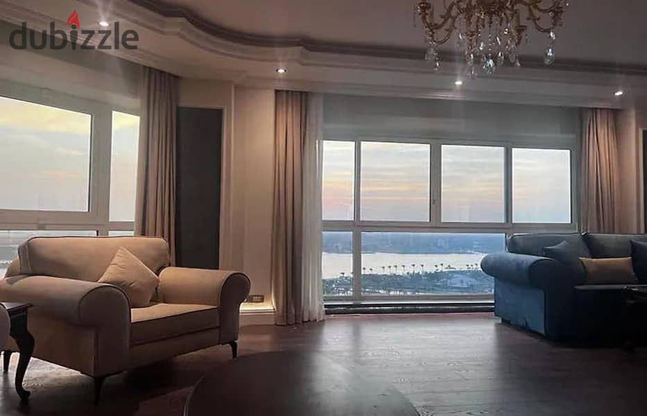 For sale, 390 sqm apartment on Maadi Corniche, immediate delivery of furniture and appliances, hotel apartment in a very elegant tower on the Nile 2