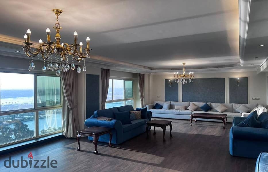 For sale, 390 sqm apartment on Maadi Corniche, immediate delivery of furniture and appliances, hotel apartment in a very elegant tower on the Nile 3