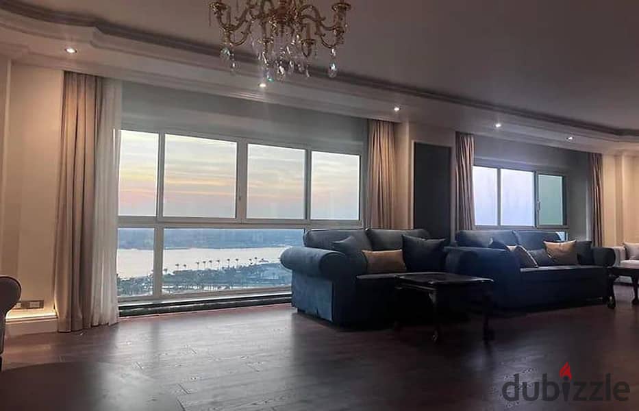 For sale, 390 sqm apartment on Maadi Corniche, immediate delivery of furniture and appliances, hotel apartment in a very elegant tower on the Nile 9