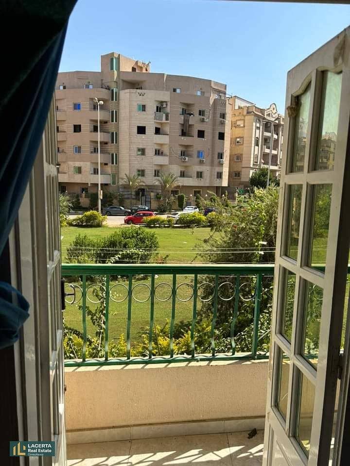 Apartment for sale with view open to the garden in Banafseg, with a private garage, fully finished, a kitchen separate, air-conditioned, New Cairo. 1