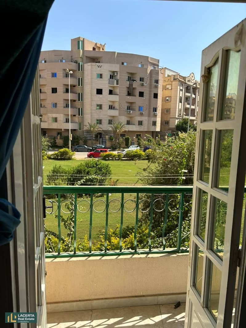 Apartment for sale with view open to the garden in Banafseg, with a private garage, fully finished, a kitchen separate, air-conditioned, New Cairo. 8