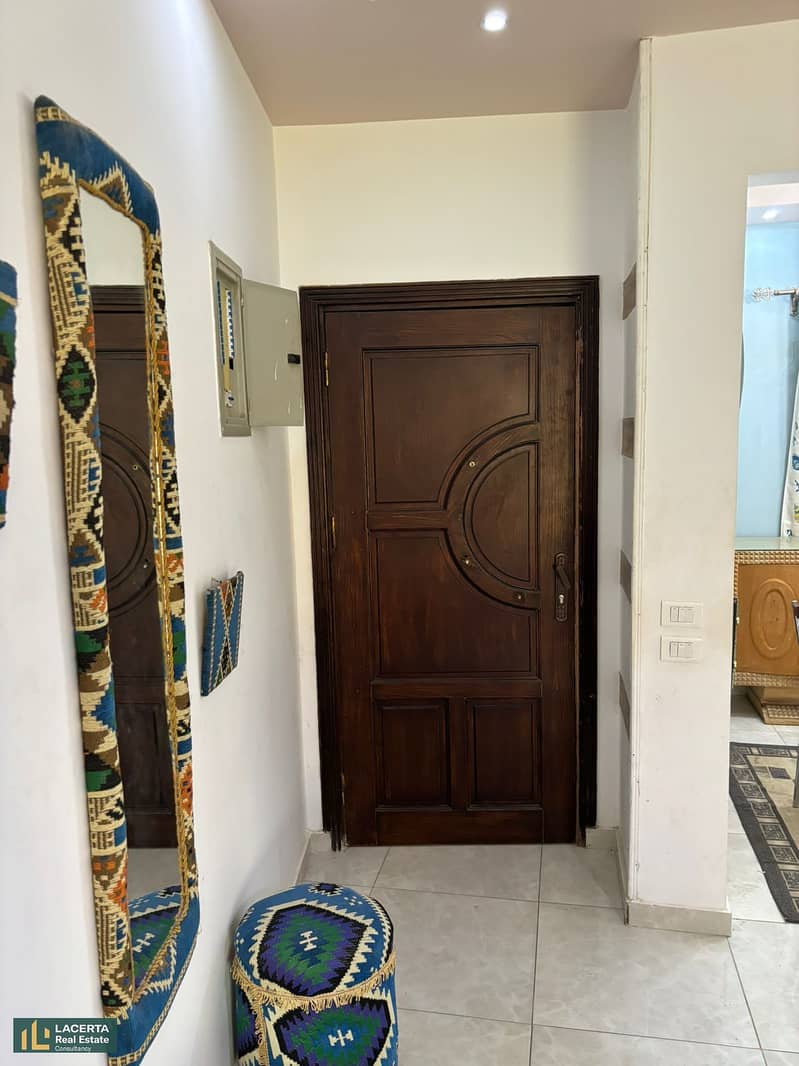 Apartment for sale with view open to the garden in Banafseg, with a private garage, fully finished, a kitchen separate, air-conditioned, New Cairo. 9