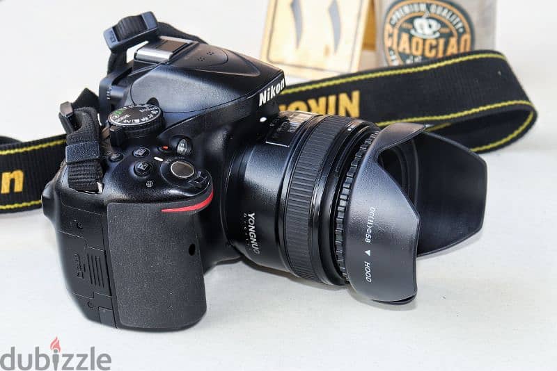 نيكون D5200 بلينس يونجنو 50mm F1.8G حالة الزيرو وكوفر سليكون 4