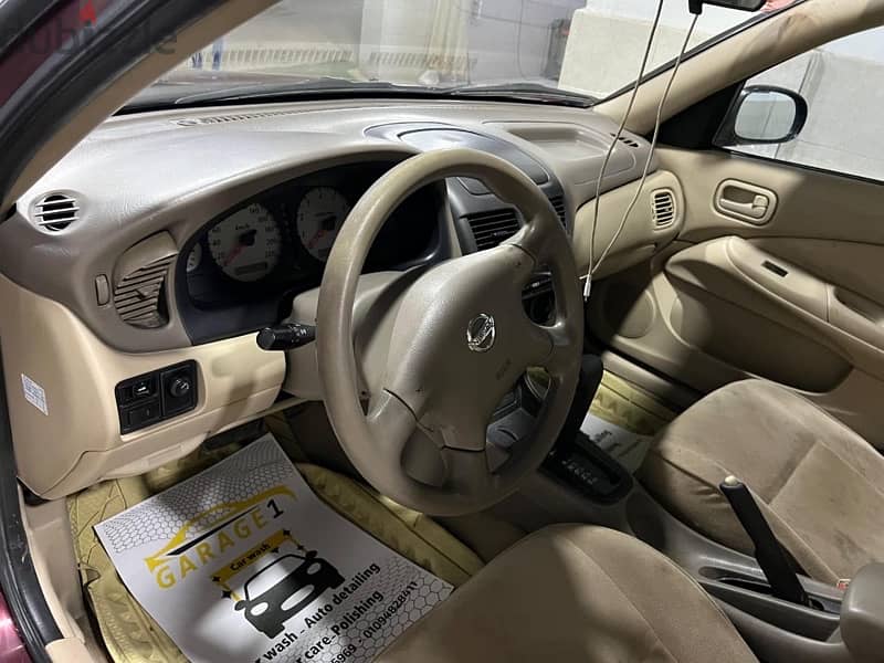 Nissan Sunny 2009 3