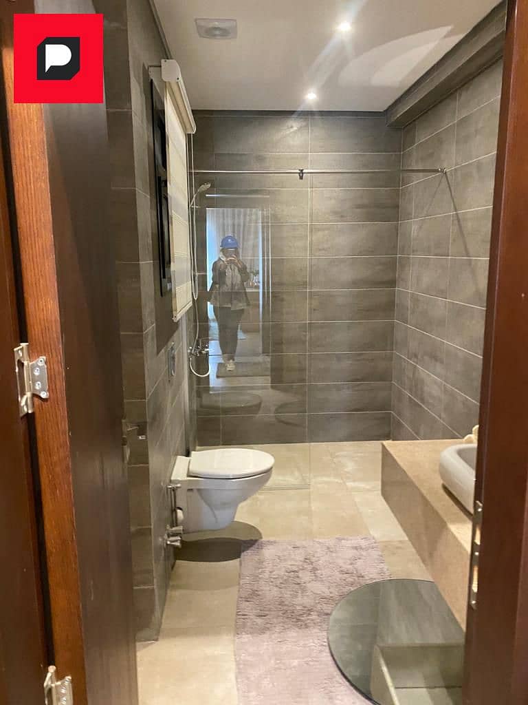 Two-bedroom apartment in a Prime location for sale in Sarai Compound in New Cairo on Suez Road near the Fifth Settlement, Cairo Airport and Nasr City 12