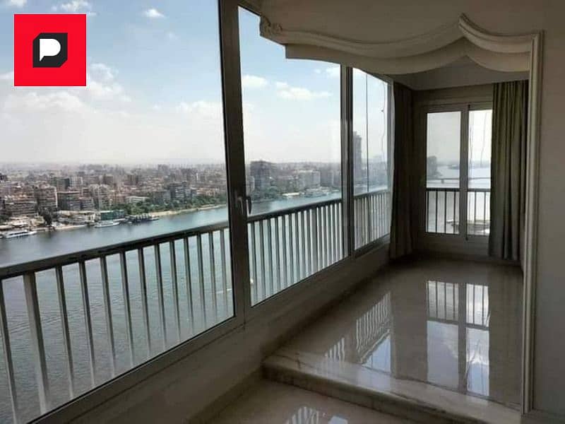 Apartment for sale, immediate delivery, with air conditioners and furnishings, 3 rooms, on a terrace on the Nile, managed by the Gloria Hotel 2