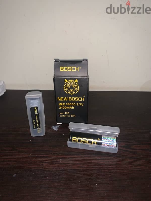 جهاز geek vape L200 معاها بطاريتين new bosch وتانك ريبلد gear V2 6