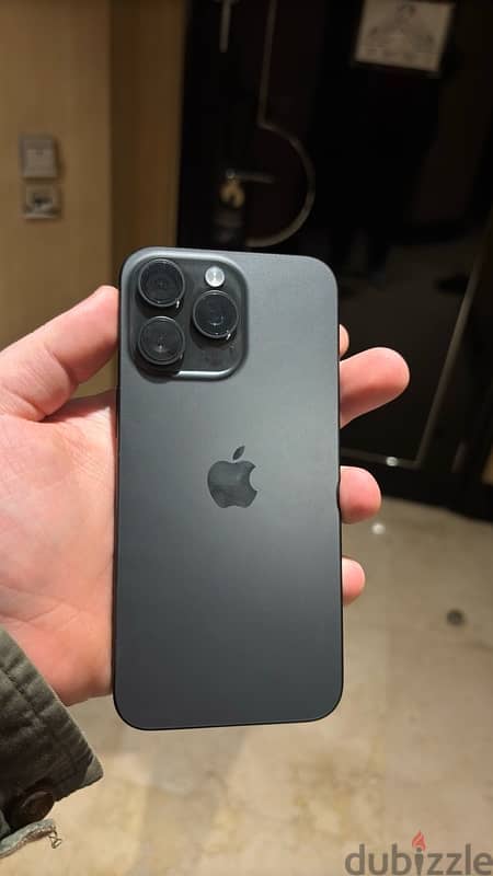 iPhone 15 pro max 1tb black titanium 4