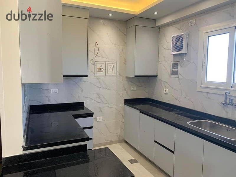 apartment for rent in Beverly Hills - El Sheikh Zayed - kitchen / Ac's 0