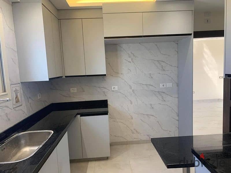 apartment for rent in Beverly Hills - El Sheikh Zayed - kitchen / Ac's 2