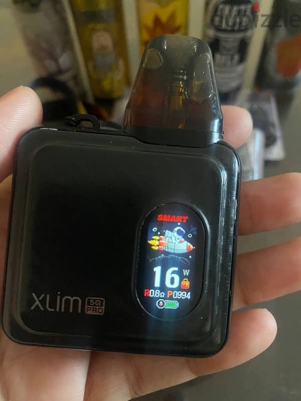 SQ Xlim Pro with accessories and liquid 7