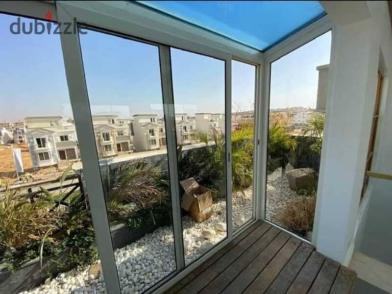 Ground floor apartment with garden, 2 rooms, immediate receipt, for sale in Mountain View iCity, Fifth Settlement 9