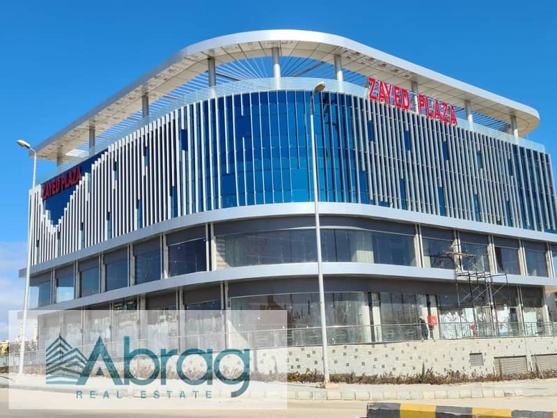 For sale, a commercial store, 88 square meters, ground floor, immediate receipt, installments, Zayed Plaza Mall, Sheikh Zayed 0