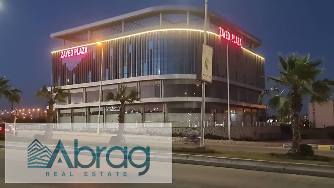 For sale, a commercial store, 88 square meters, ground floor, immediate receipt, installments, Zayed Plaza Mall, Sheikh Zayed 1