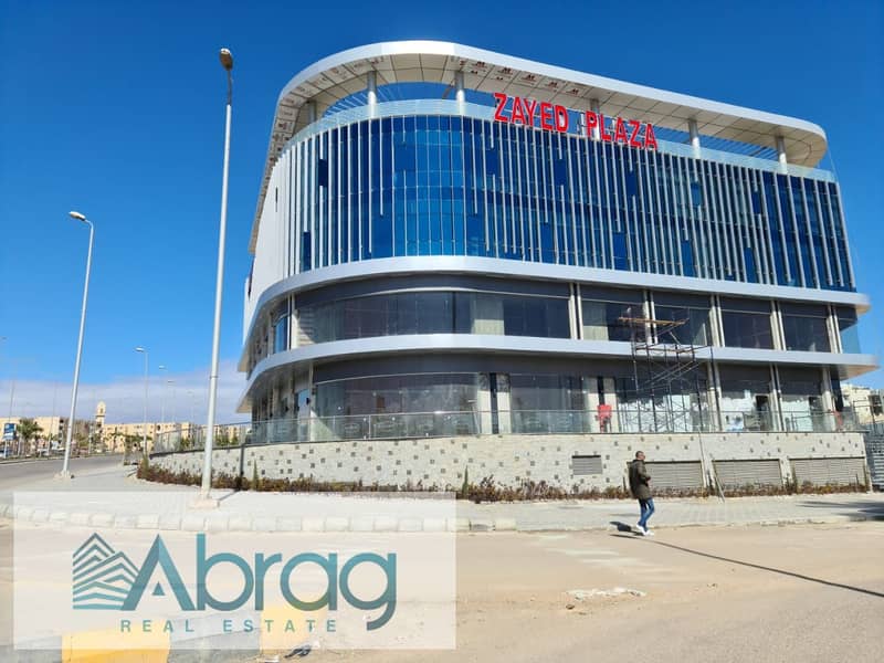 For sale, a commercial store, 88 square meters, ground floor, immediate receipt, installments, Zayed Plaza Mall, Sheikh Zayed 3