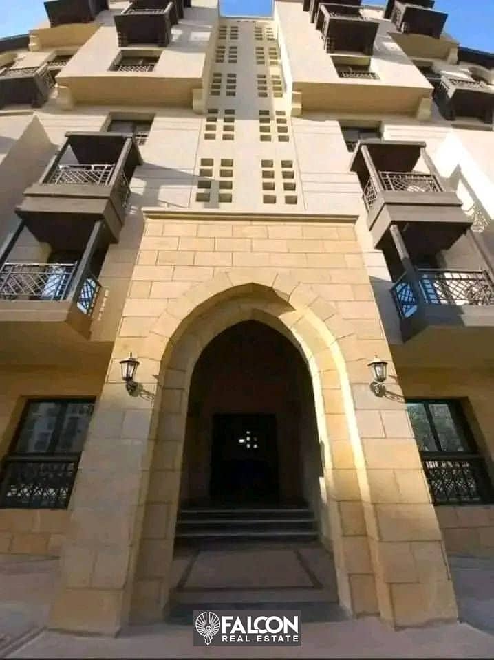 Two-bedroom apartment with a fantastic view and location, immediate delivery, for sale, High End finishing, in Fustat "Arabesque", with a 10% down pay 0